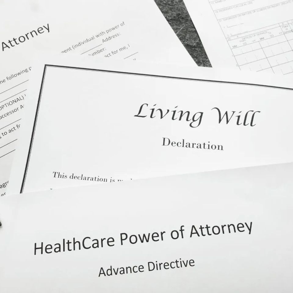 Estate planning documents and a pen on a desk